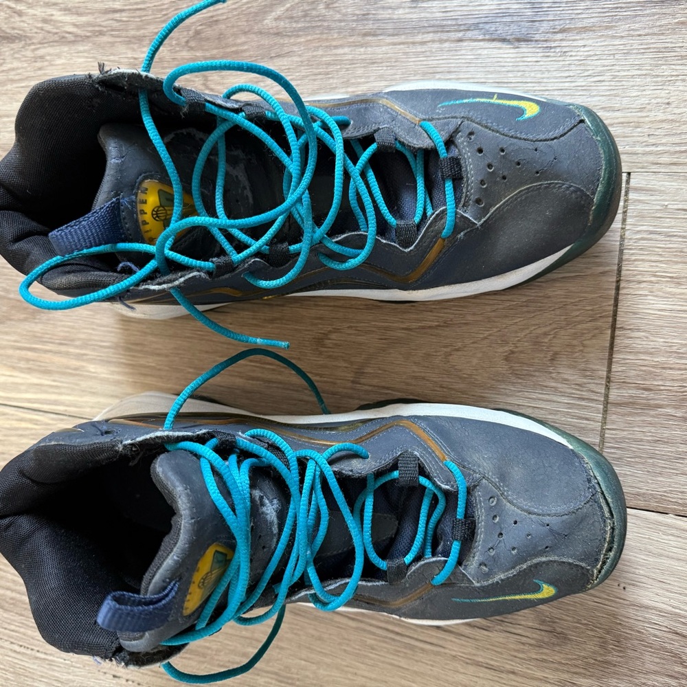 Nike Men's Black Athletic Shoes with Teal Laces and Yellow Accents